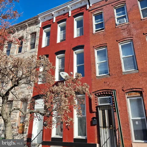 a front view of a multi story residential apartment building