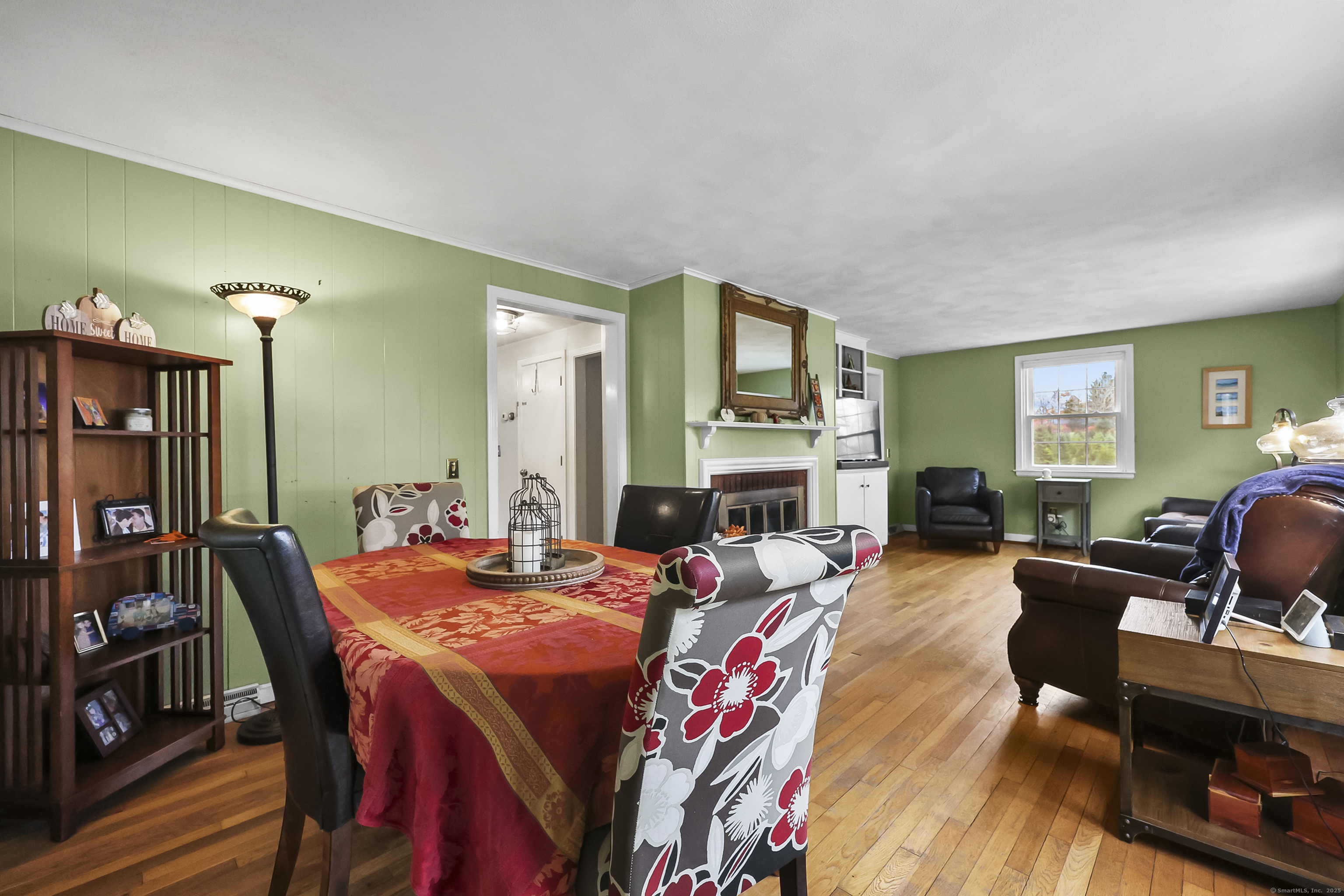 559 East Street Hebron, CT 06248 - Photo 22 of 31 a view of a dining room with furniture and wooden floor