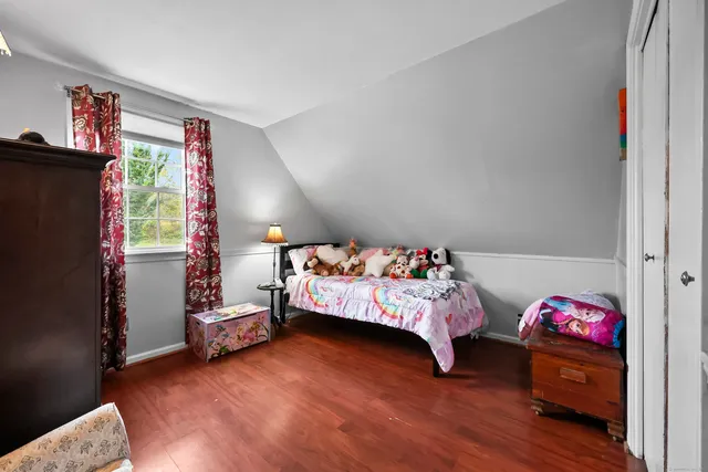 a bed room with a bed and a couch