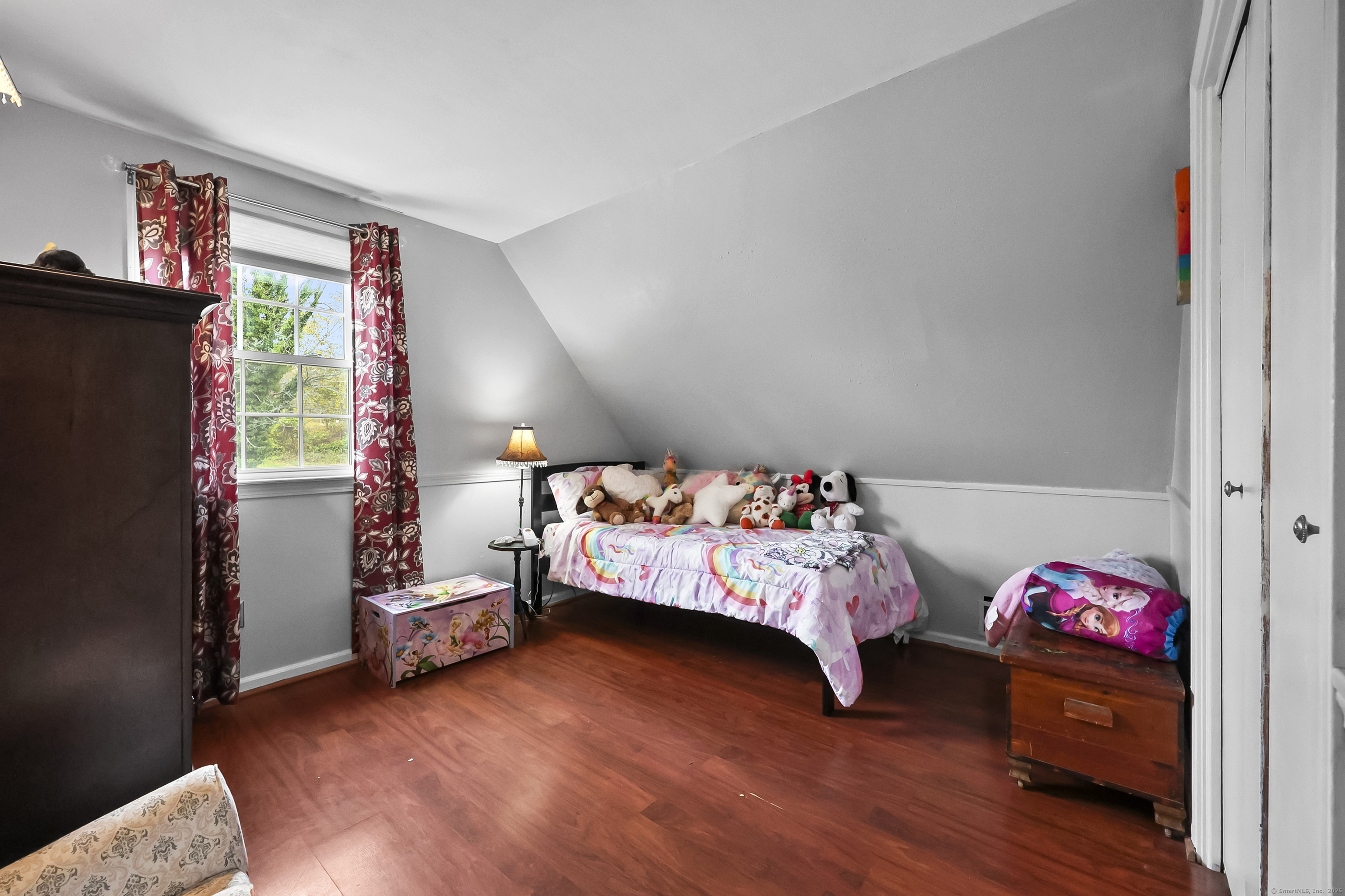 559 East Street Hebron, CT 06248 - Photo 23 of 31 a bed room with a bed and a couch