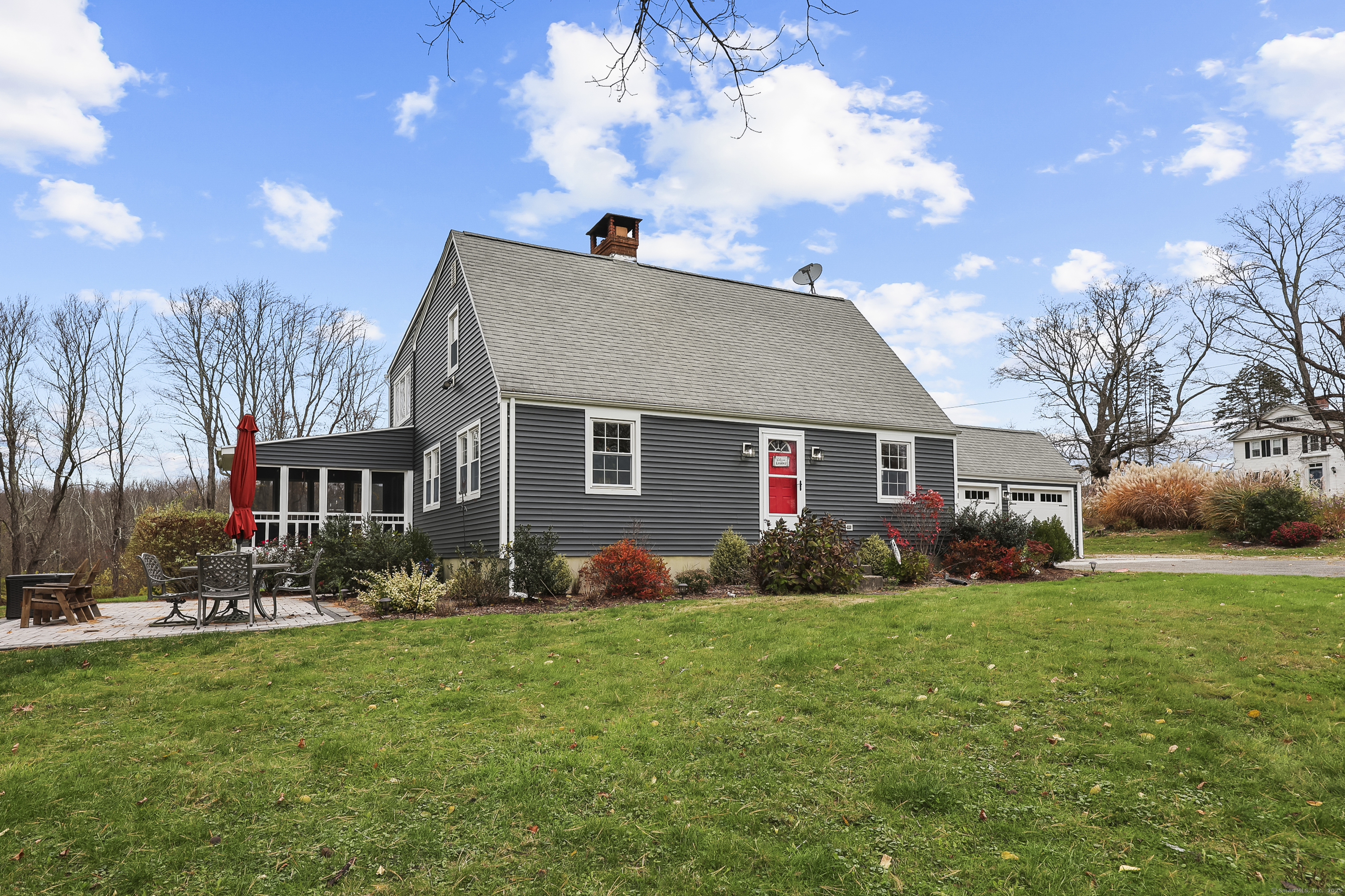 559 East Street Hebron, CT 06248 - Photo 26 of 31 a front view of house with yard and green space