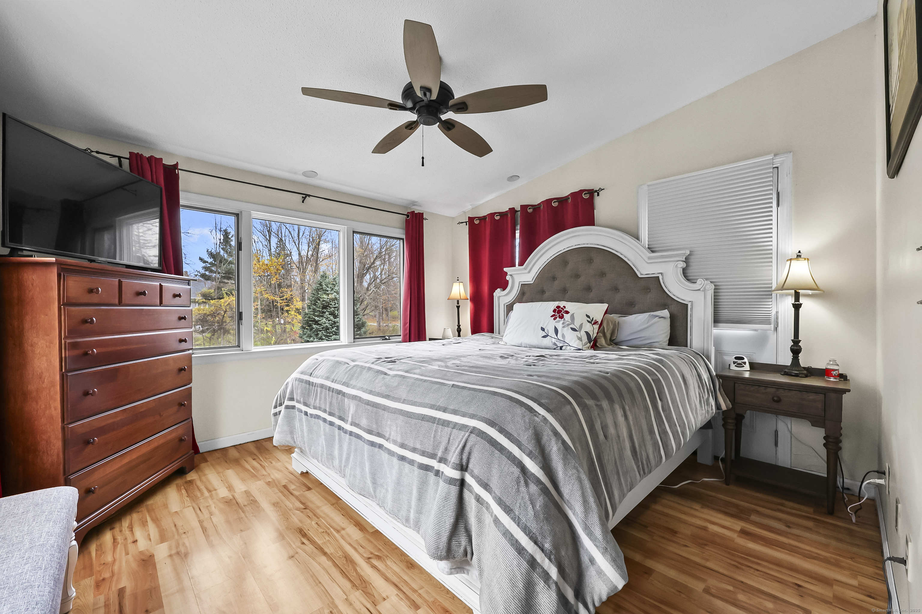 559 East Street Hebron, CT 06248 - Photo 5 of 31 a bedroom with a bed and a large window