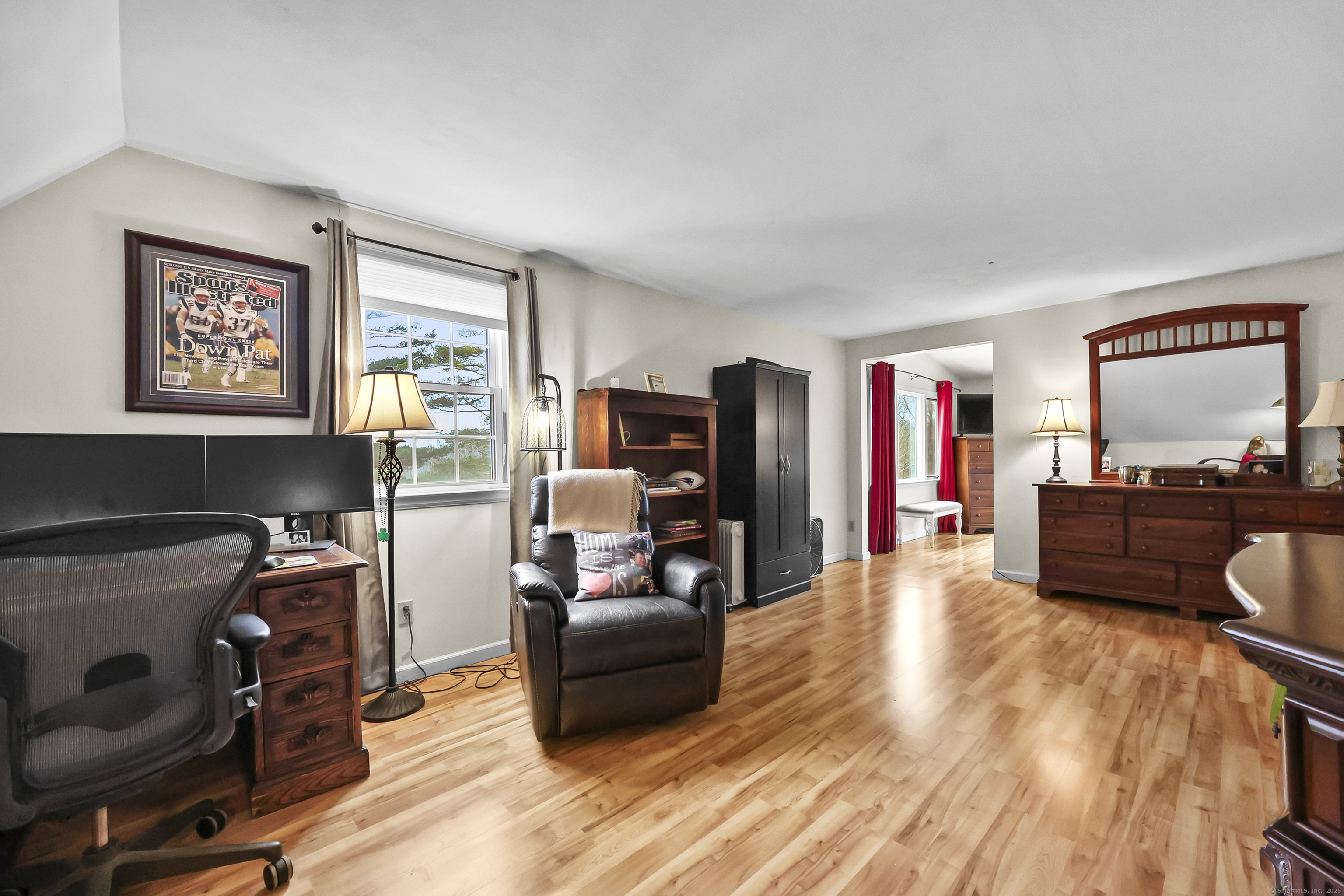559 East Street Hebron, CT 06248 - Photo 6 of 31 a living room with furniture and a flat screen tv