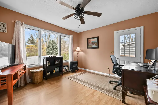 a room with furniture and window