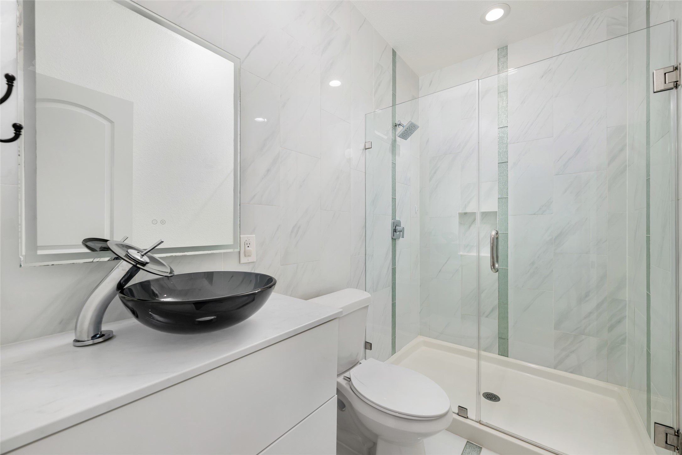507 Rawhide Road Seguin, TX 78155 - Photo 29 of 40 Full bathroom featuring vanity, a marble finish shower, tile walls, and recessed lighting