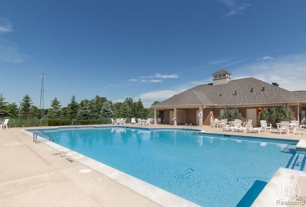 4040 Chase Ridge Lane Howell, MI 48843 - Photo 26 of 26 pool clubhouse.jpg