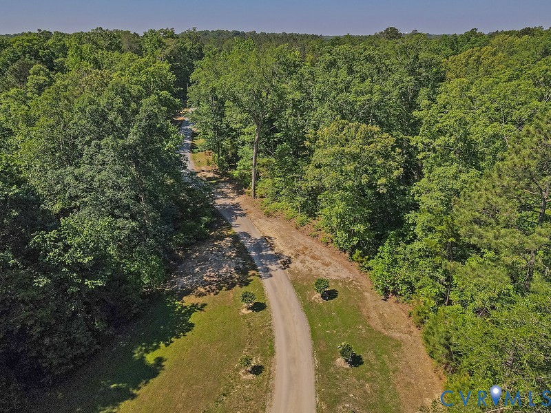 9425 Marie Road New Kent, VA 23124 - Photo 15 of 55 a view of a lake with a yard