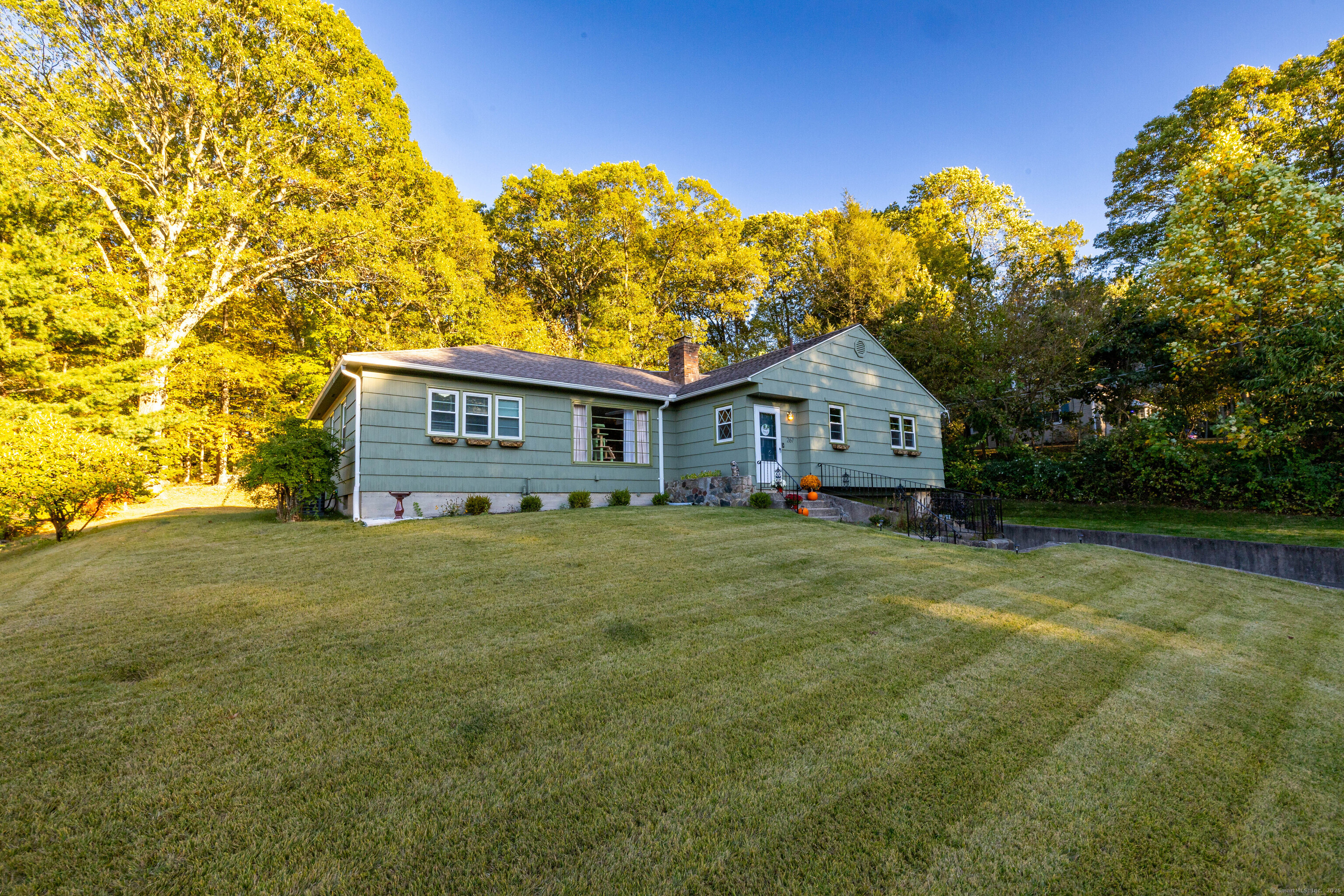 267 Hull Street Bristol, CT 06010 - Photo 1 of 22 a house view with a garden space