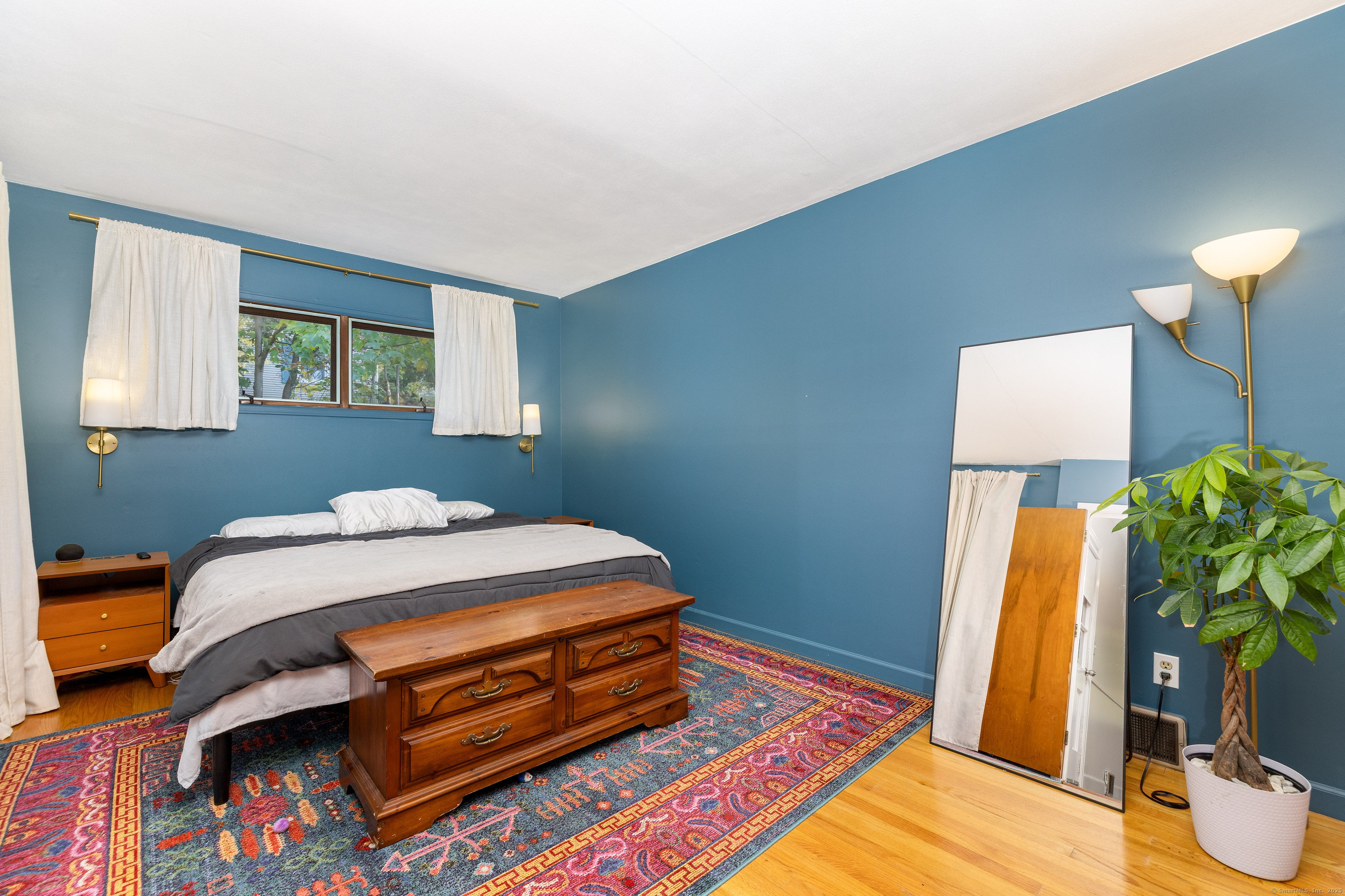 267 Hull Street Bristol, CT 06010 - Photo 7 of 22 a bedroom with a bed and a flat screen tv