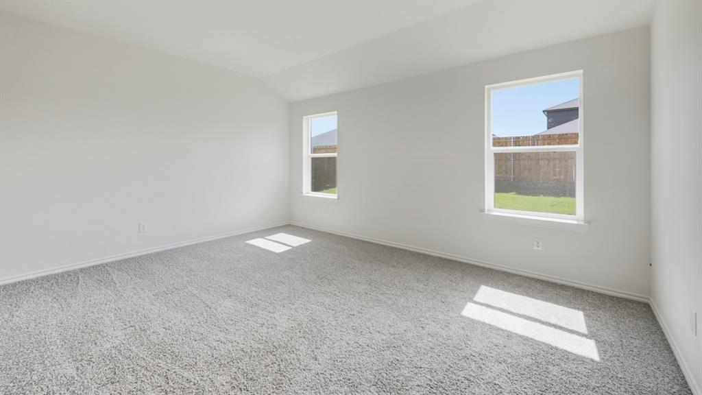312 Wild Rose Way Princeton, TX 75407 - Photo 11 of 39 an empty room with a window