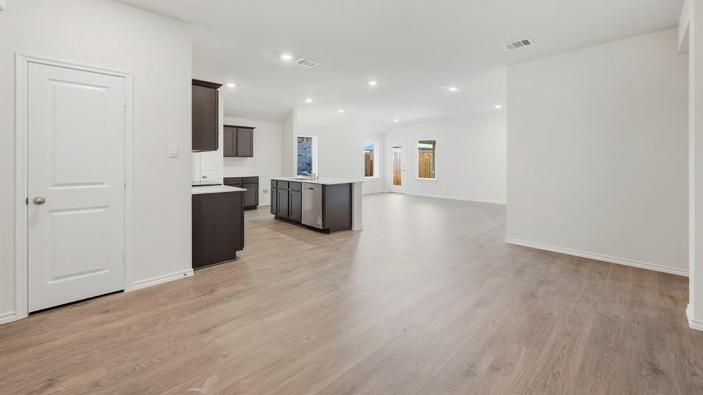 312 Wild Rose Way Princeton, TX 75407 - Photo 32 of 39 a view of kitchen with furniture and refrigerator