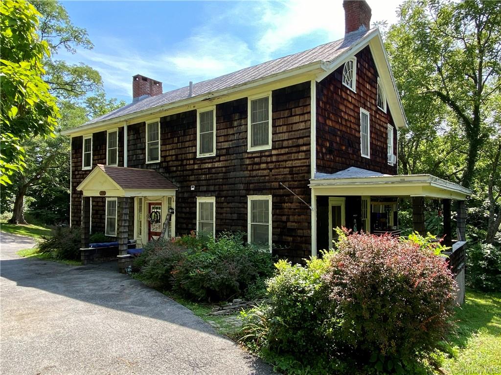 Beautiful farmhouse colonial situated on 7.6 acres.