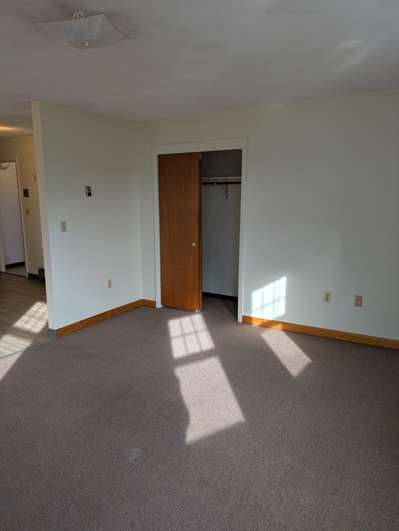 569 Somerville Avenue, Unit 5 Somerville, MA 02143 - Photo 5 of 8 a view of empty room