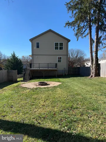 a view of a backyard of the house