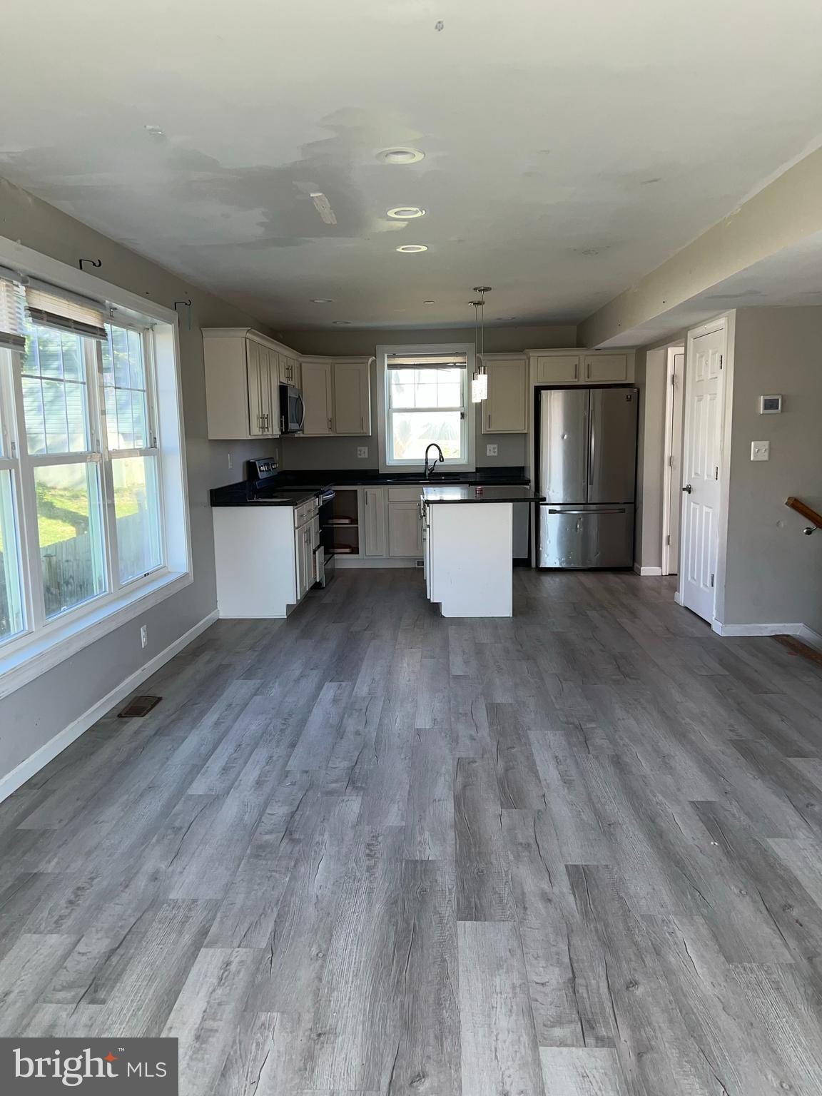 191 East George Street Westminster, MD 21157 - Photo 4 of 10 a kitchen with a refrigerator and a sink
