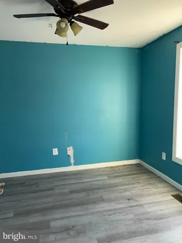 a view of a room with an empty space