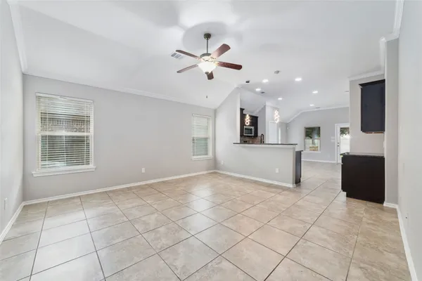 a view of a kitchen with sink and cabinet