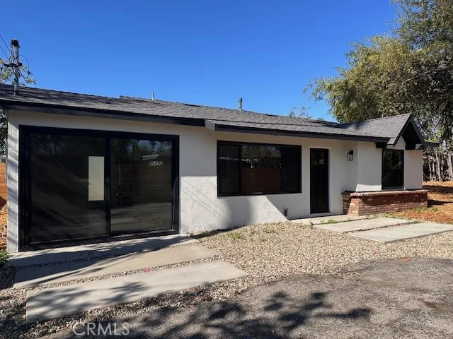 14621 Clark Street Baldwin Park, CA 91706 - Photo 1 of 28 a view of a house with a patio