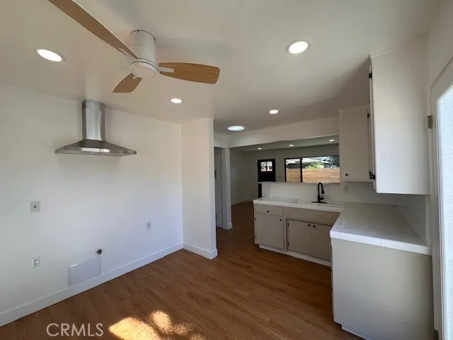 14621 Clark Street Baldwin Park, CA 91706 - Photo 10 of 28 a kitchen with a sink stainless steel appliances and cabinets