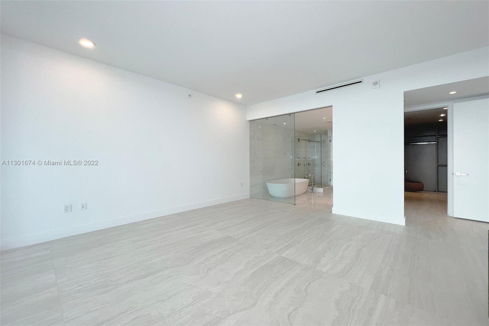 North Beach Miami Beach, FL 33141 - Photo 11 of 23 a view of a room with wooden floor