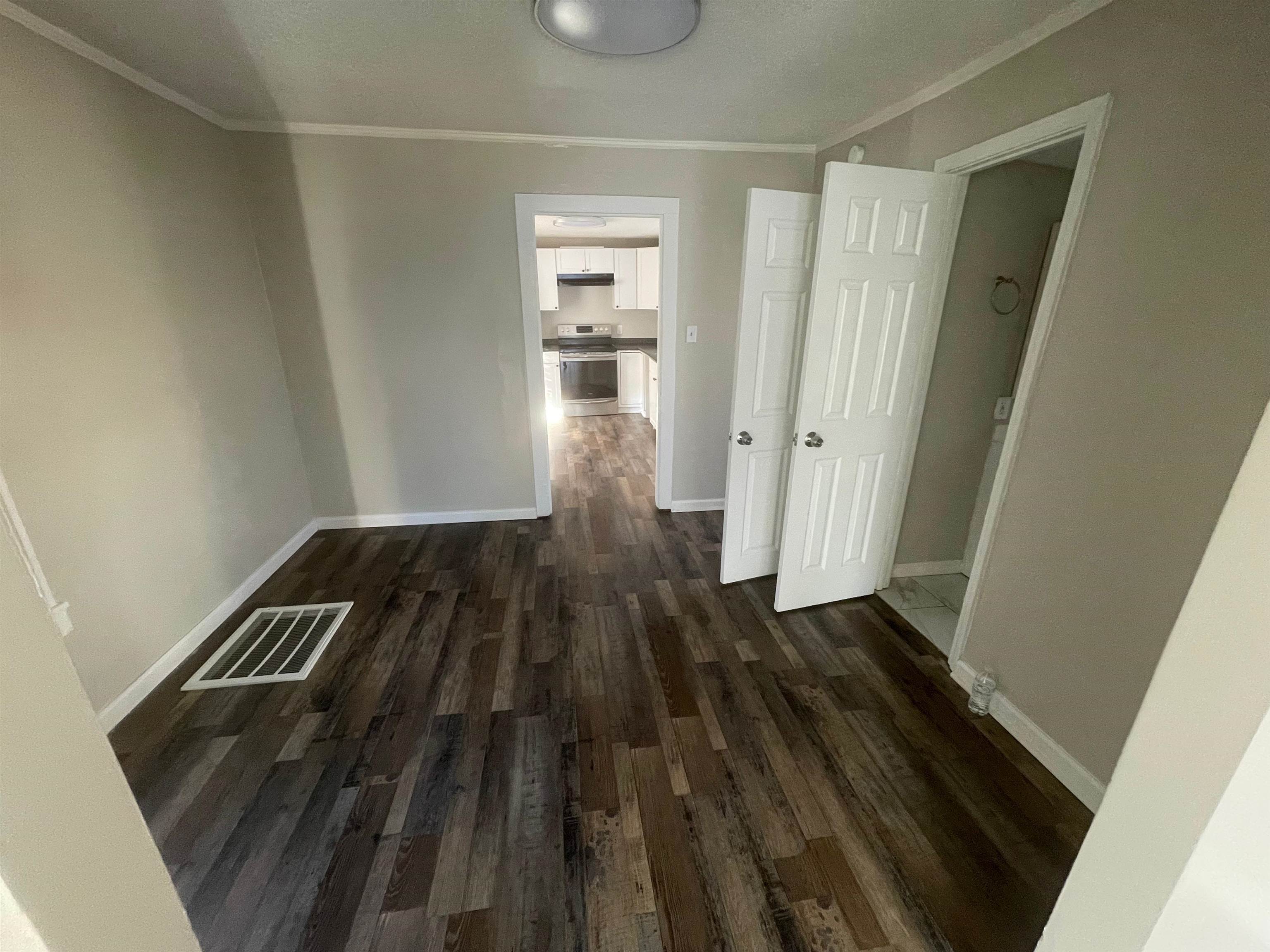 3466 Carrington Road Memphis, TN 38111 - Photo 5 of 14 a view of wooden floor in an empty room