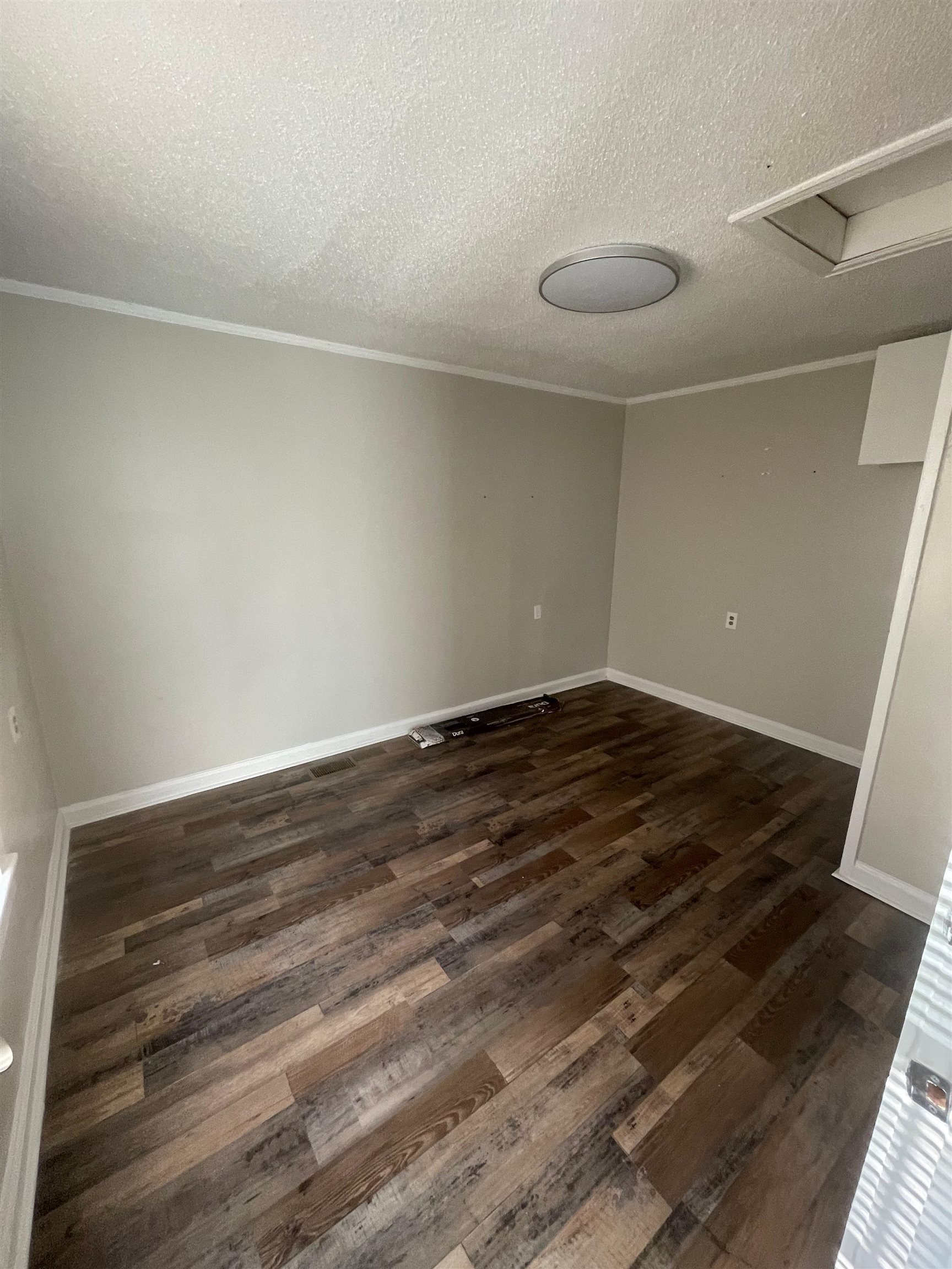 3466 Carrington Road Memphis, TN 38111 - Photo 6 of 14 a view of room with wooden floor and window