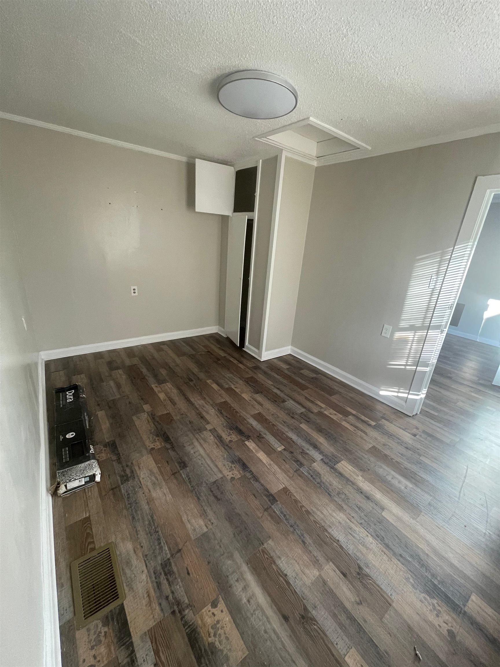 3466 Carrington Road Memphis, TN 38111 - Photo 7 of 14 a view of an empty room with wooden floor