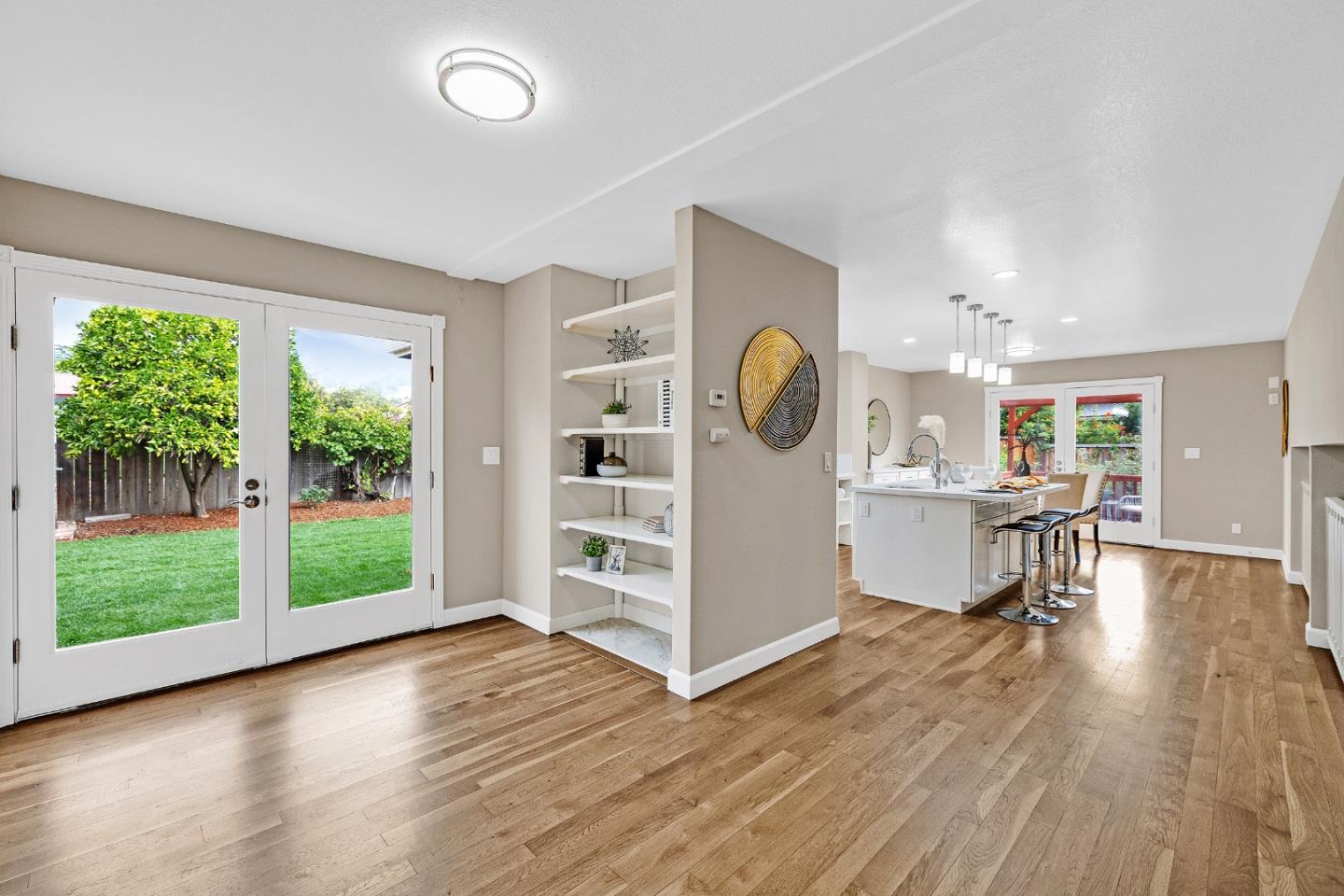 463 Becado Place Fremont, CA 94539 - Photo 11 of 74 a view of a kitchen with furniture and a fireplace