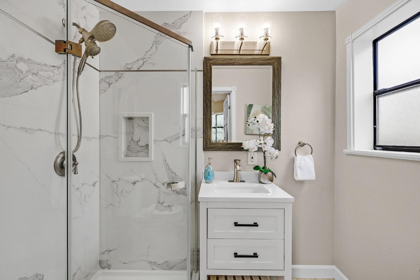 463 Becado Place Fremont, CA 94539 - Photo 15 of 74 a bathroom with a sink vanity and shower