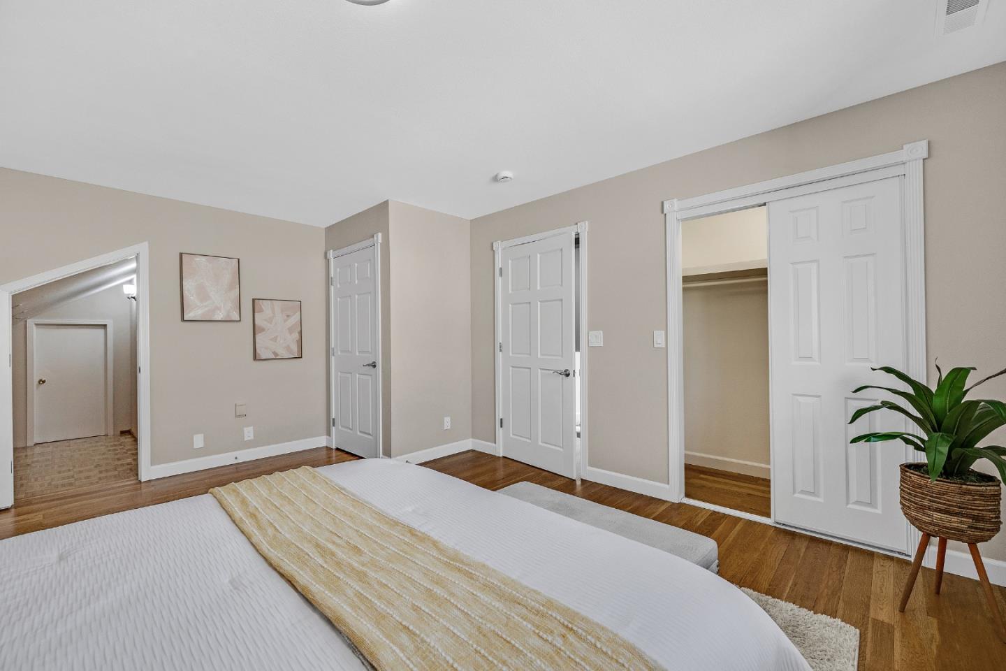 463 Becado Place Fremont, CA 94539 - Photo 25 of 74 a bedroom with a bed and wooden floor