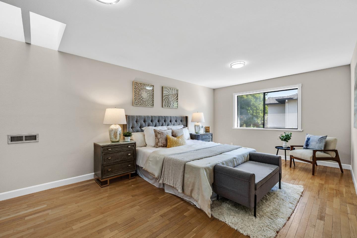 463 Becado Place Fremont, CA 94539 - Photo 31 of 74 a bedroom with a bed and wooden floor