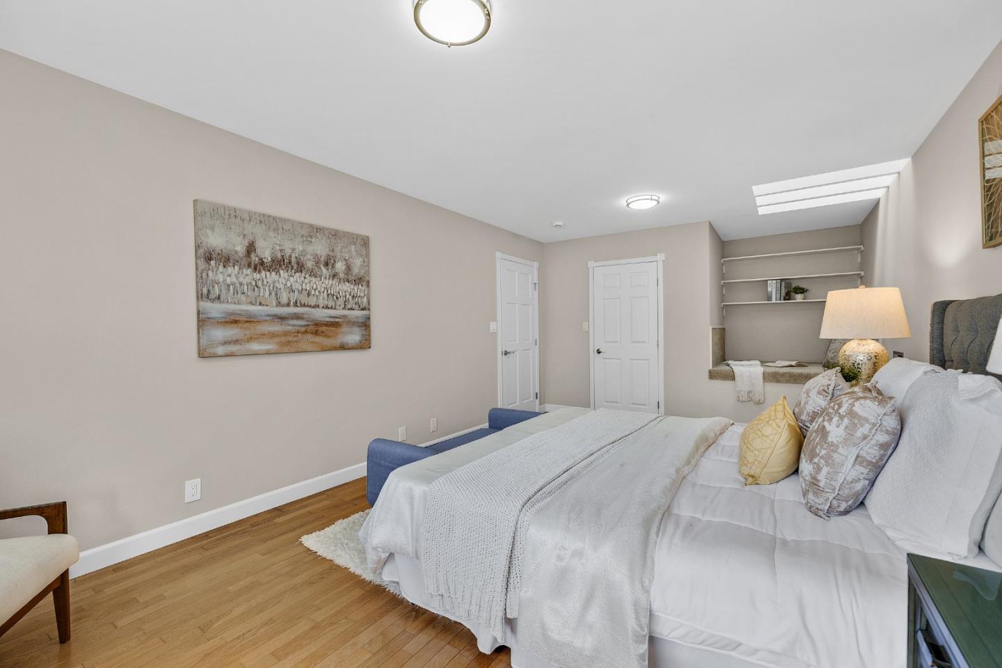 463 Becado Place Fremont, CA 94539 - Photo 32 of 74 a bedroom with a bed and a painting on the wall