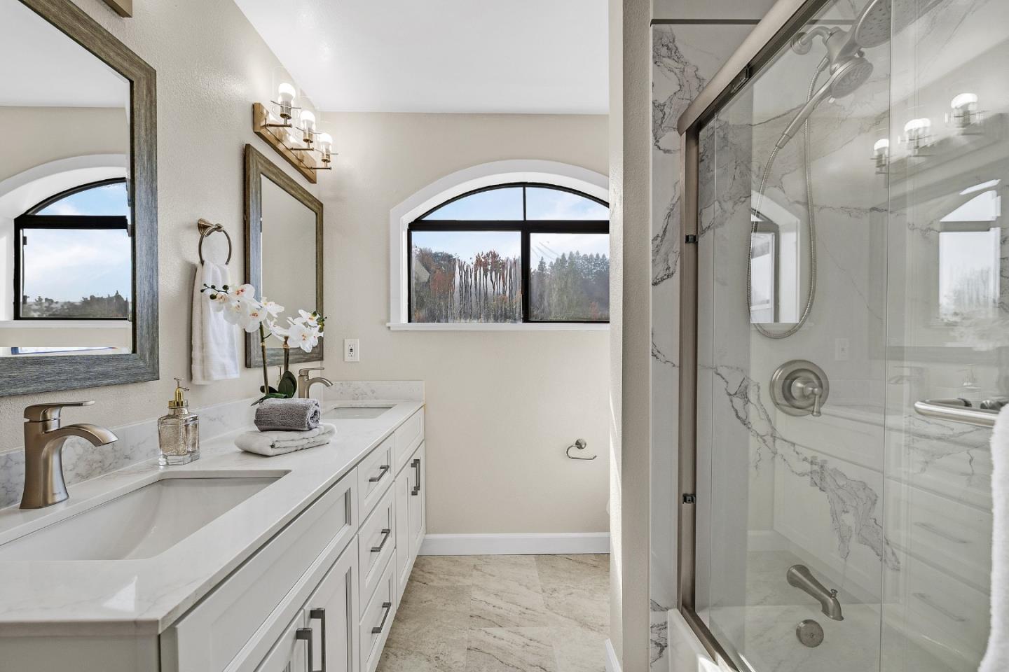 463 Becado Place Fremont, CA 94539 - Photo 33 of 74 a bathroom with a double vanity sink mirror and shower
