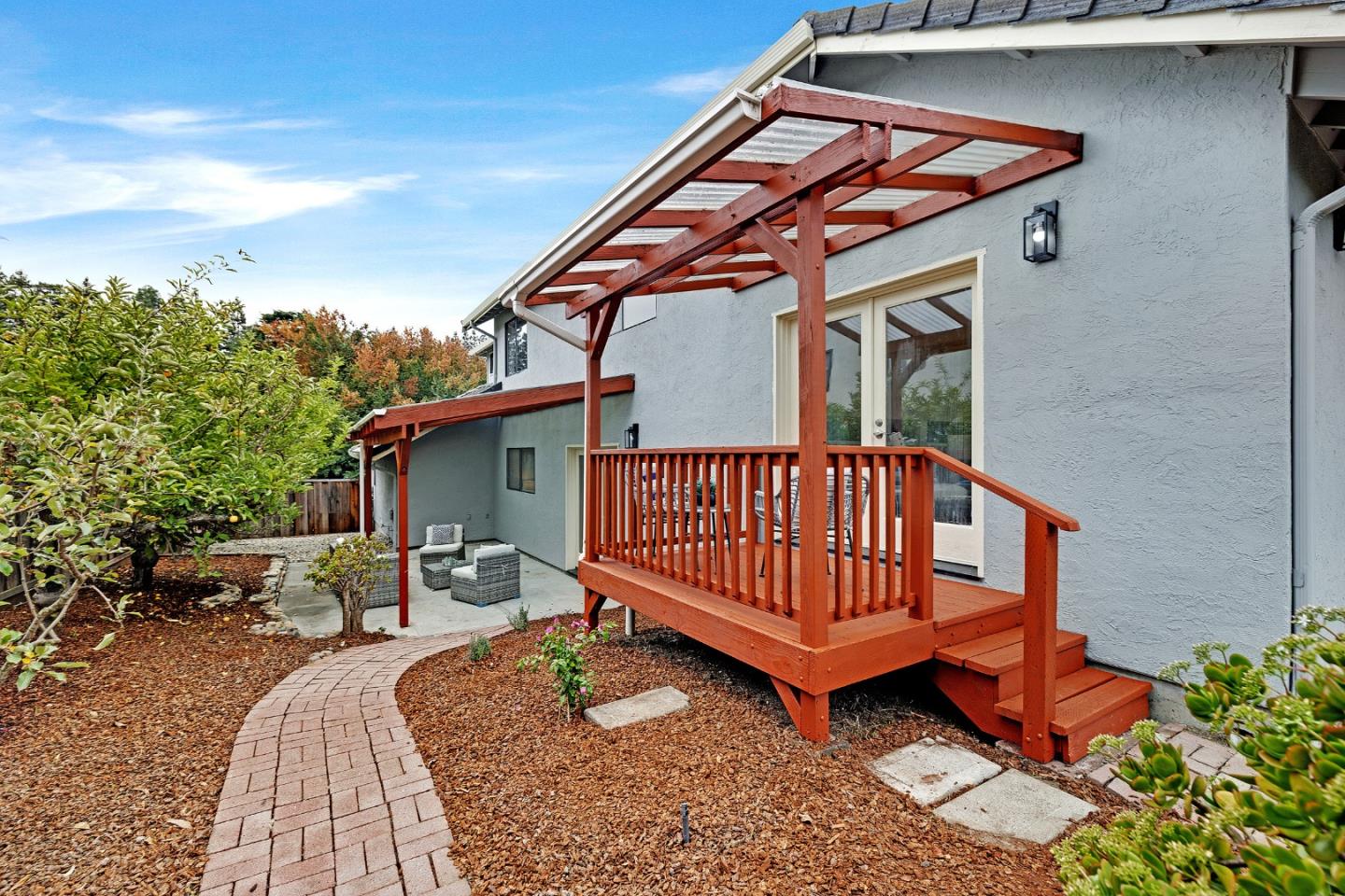 463 Becado Place Fremont, CA 94539 - Photo 45 of 74 a view of backyard with a deck and a garden