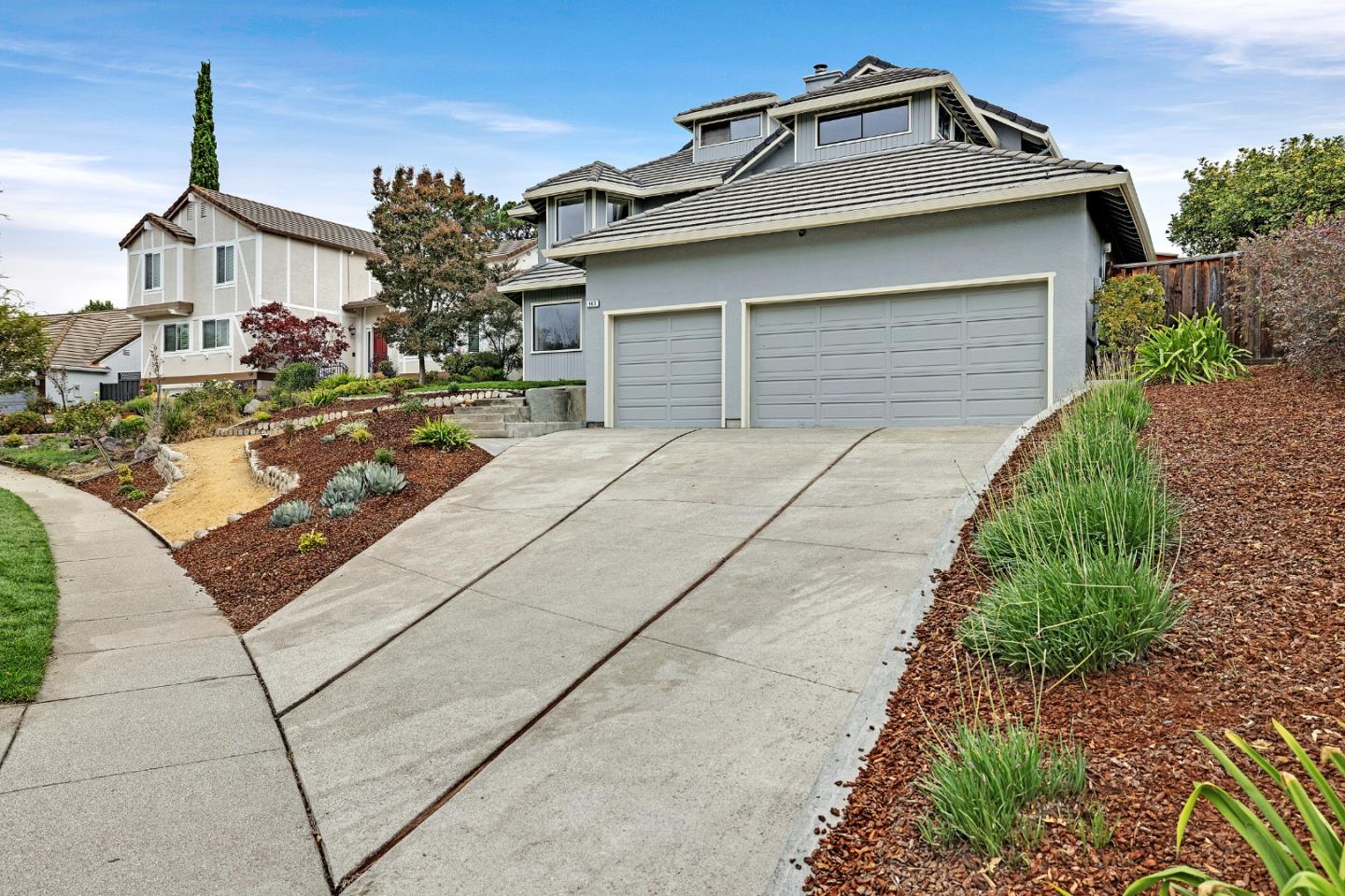 463 Becado Place Fremont, CA 94539 - Photo 55 of 74 a front view of a house with garden