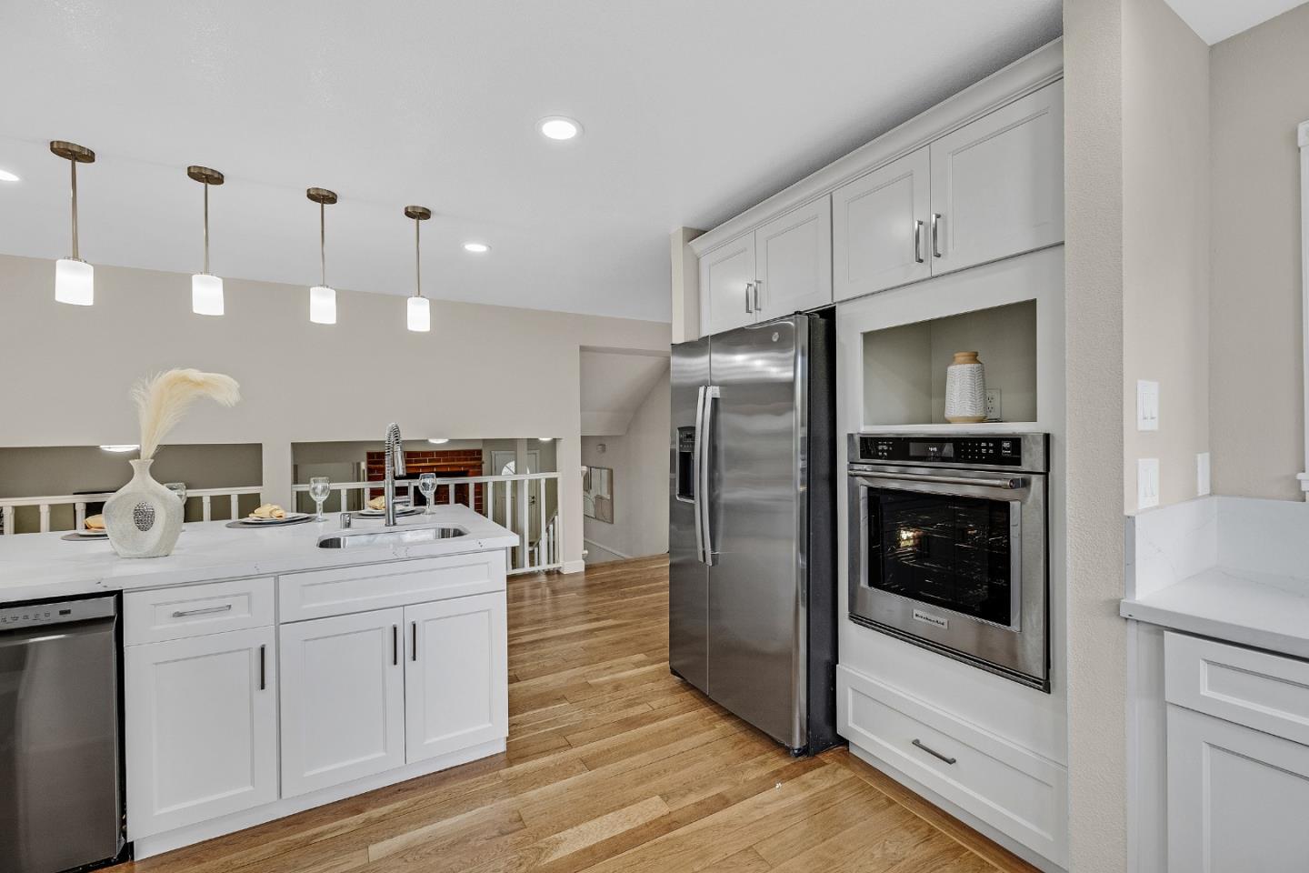 463 Becado Place Fremont, CA 94539 - Photo 10 of 74 a kitchen with a sink stainless steel appliances and cabinets