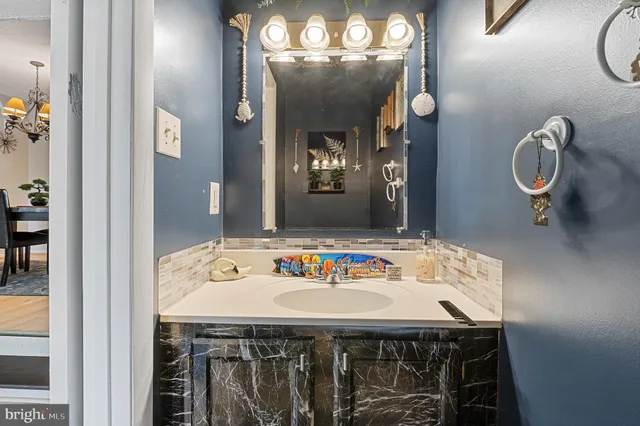 a dining room with a table and chairs