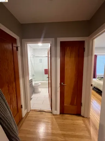 a view of a closet area with living room