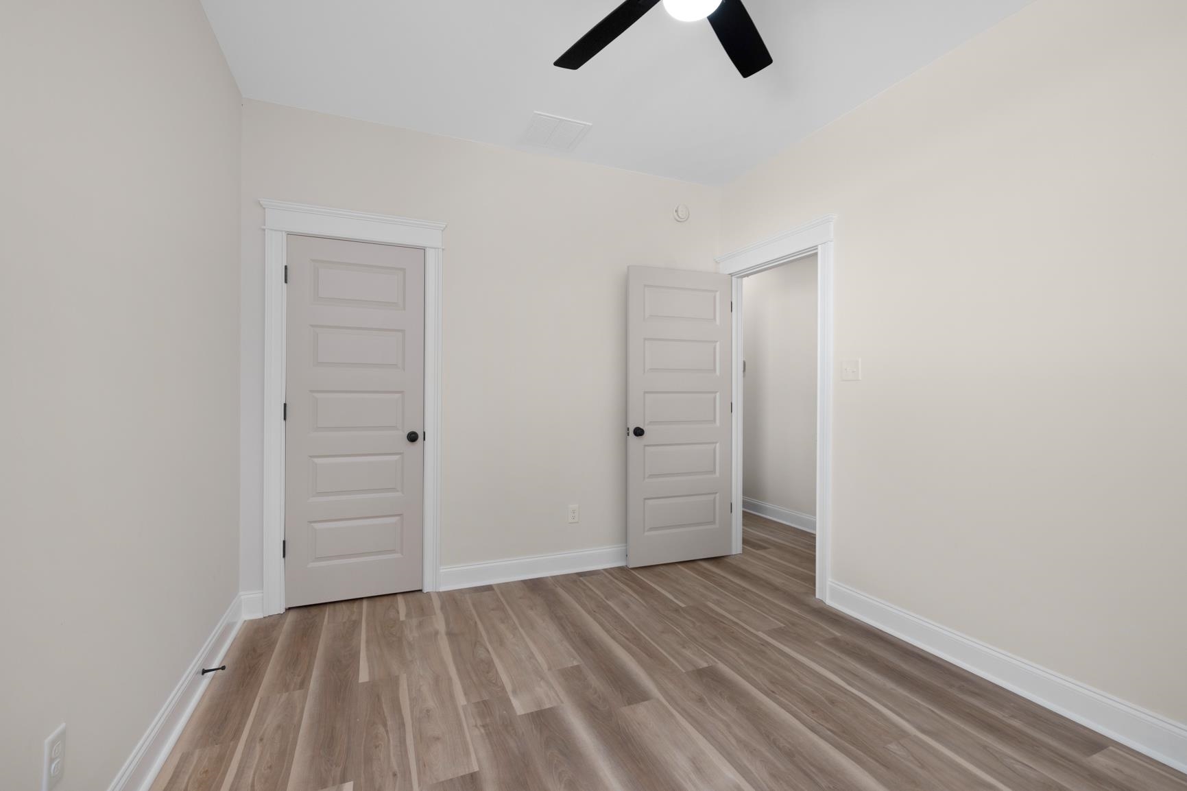 319 North Maple Street Covington, TN 38019 - Photo 27 of 32 an empty room with closet and windows