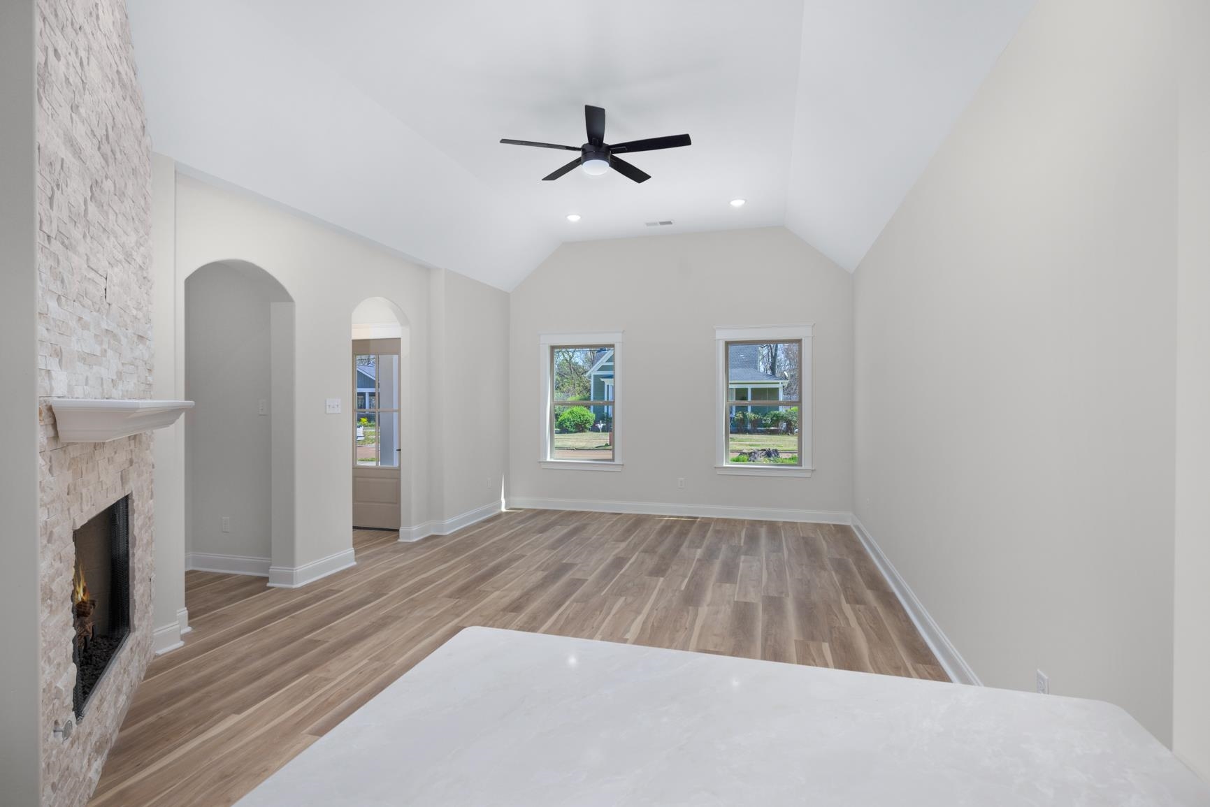 319 North Maple Street Covington, TN 38019 - Photo 6 of 32 wooden floor in an empty room with a window