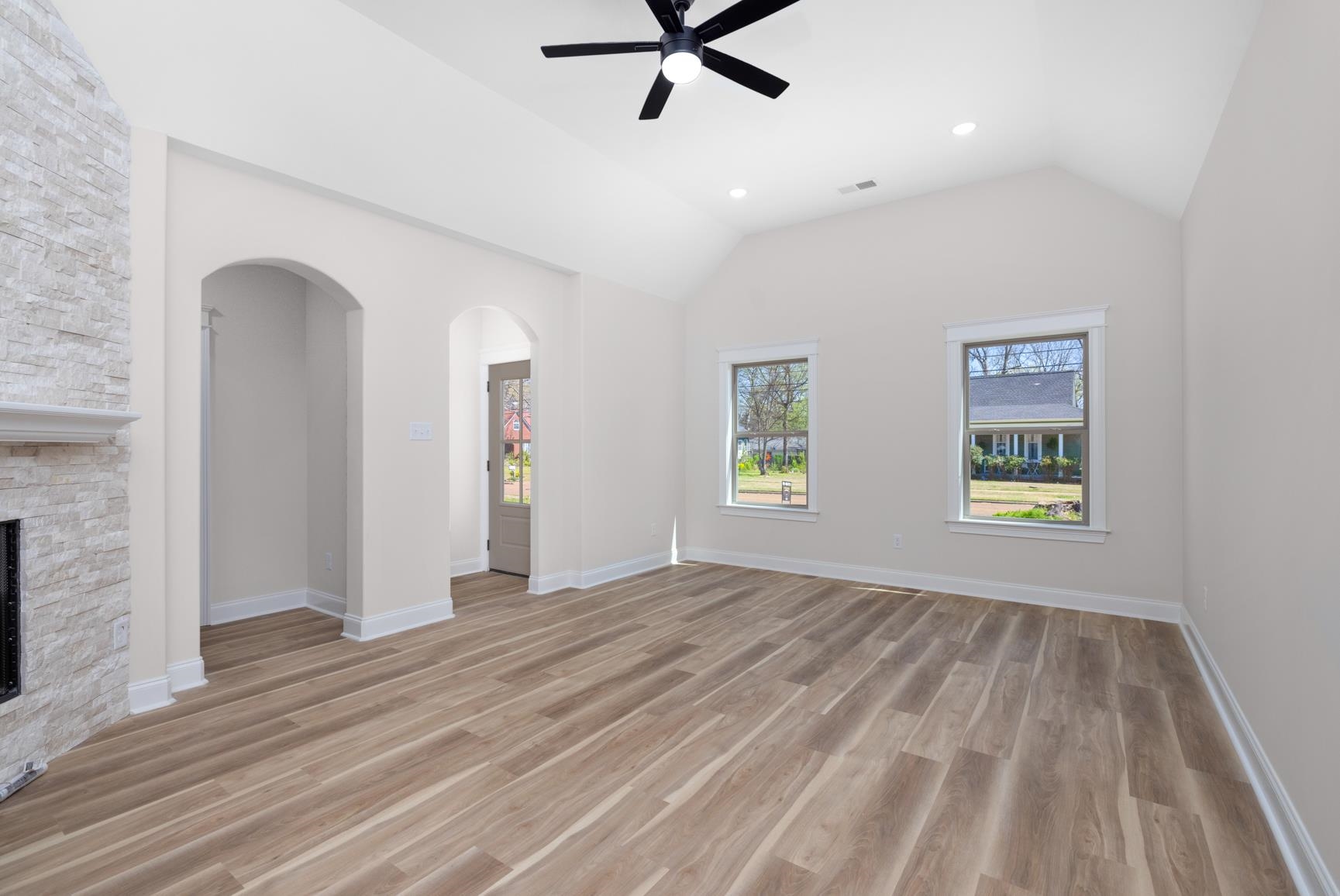 319 North Maple Street Covington, TN 38019 - Photo 8 of 32 wooden floor in an empty room with a window