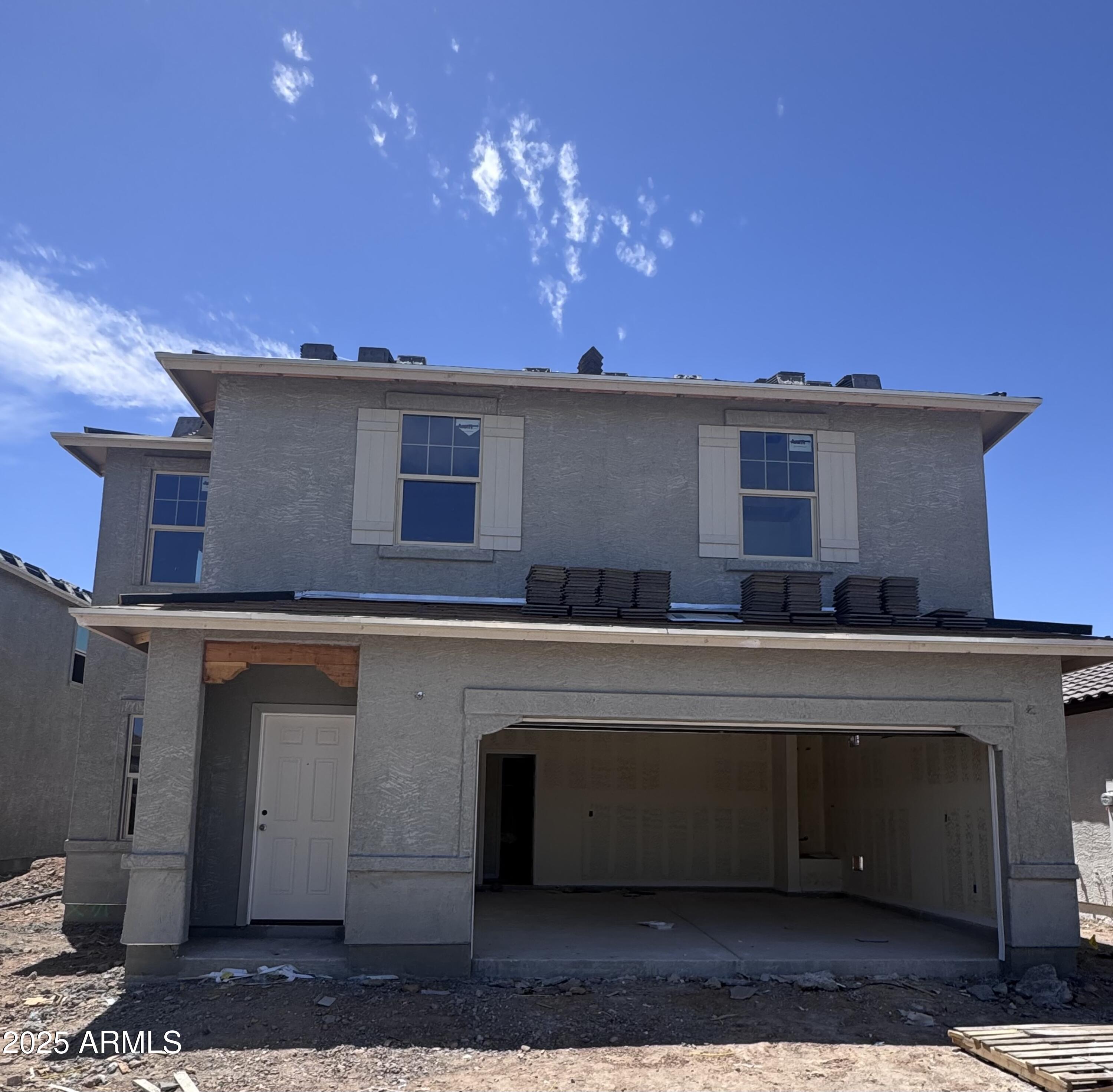 10016 South 58th Lane Laveen, AZ 85339 - Photo 2 of 17 a view of a house with a balcony