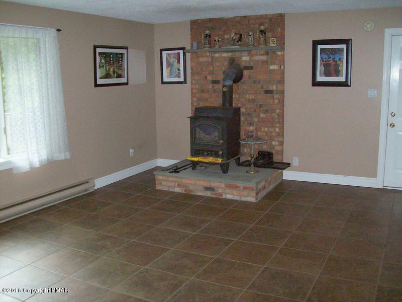 201 Balson Road Stroudsburg, PA 18360 - Photo 18 of 26 Family room w-Wood stove