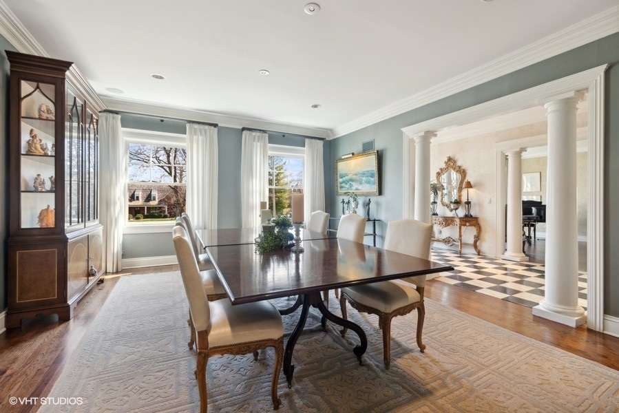 710 South County Line Road Hinsdale, IL 60521 - Photo 20 of 63 a view of a dining room with furniture window and wooden floor