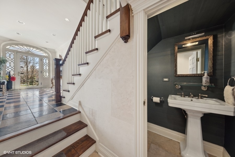710 South County Line Road Hinsdale, IL 60521 - Photo 27 of 63 a view of entryway and hall with wooden floor