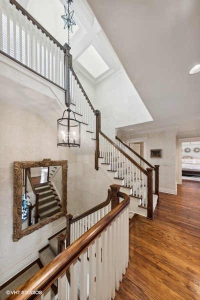 710 South County Line Road Hinsdale, IL 60521 - Photo 30 of 63 a view of entryway and hall with wooden floor