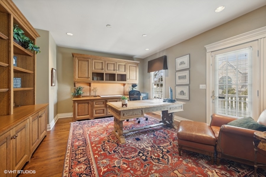 710 South County Line Road Hinsdale, IL 60521 - Photo 41 of 63 a living room with furniture large window and wooden floor