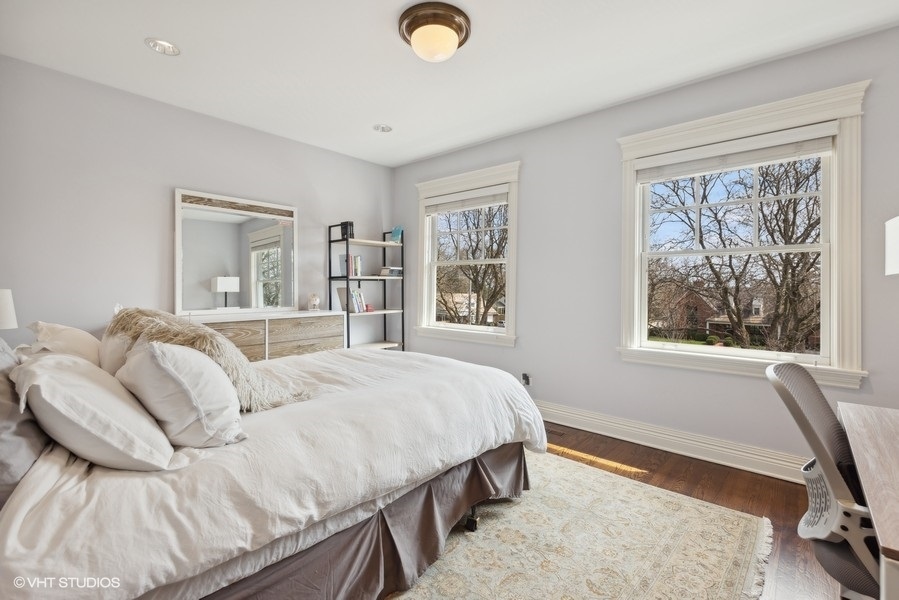 710 South County Line Road Hinsdale, IL 60521 - Photo 42 of 63 a bedroom with a bed and a window