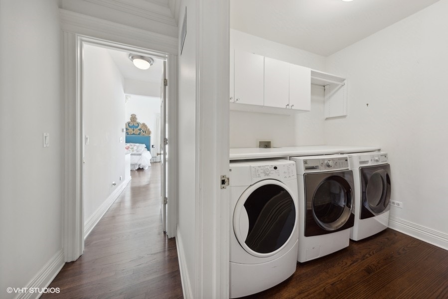 710 South County Line Road Hinsdale, IL 60521 - Photo 44 of 63 a view of a hallway with washer and dryer