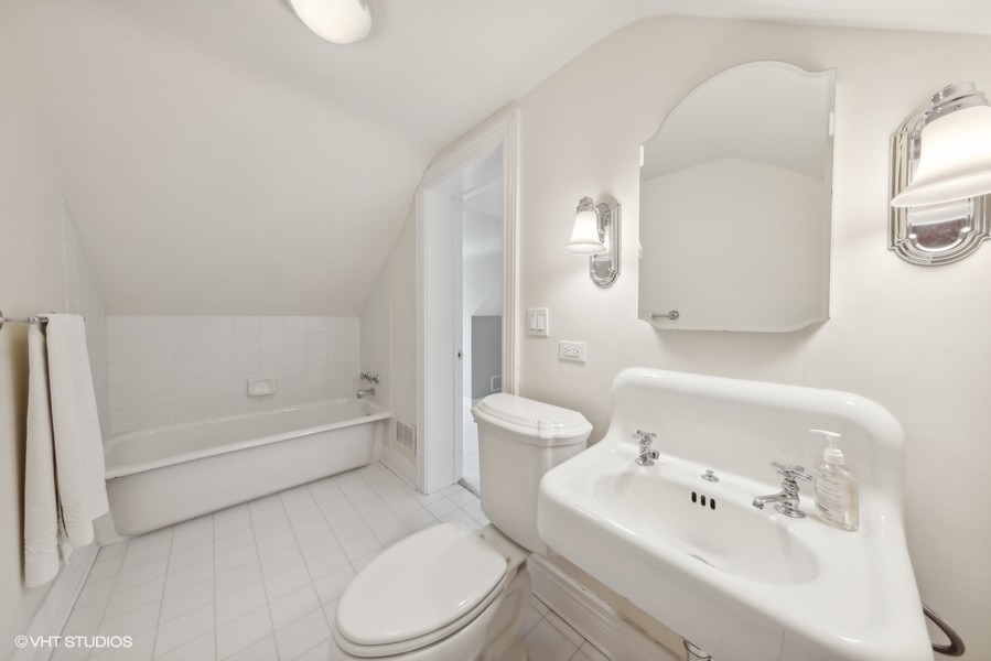 710 South County Line Road Hinsdale, IL 60521 - Photo 46 of 63 a bathroom with a sink toilet and shower